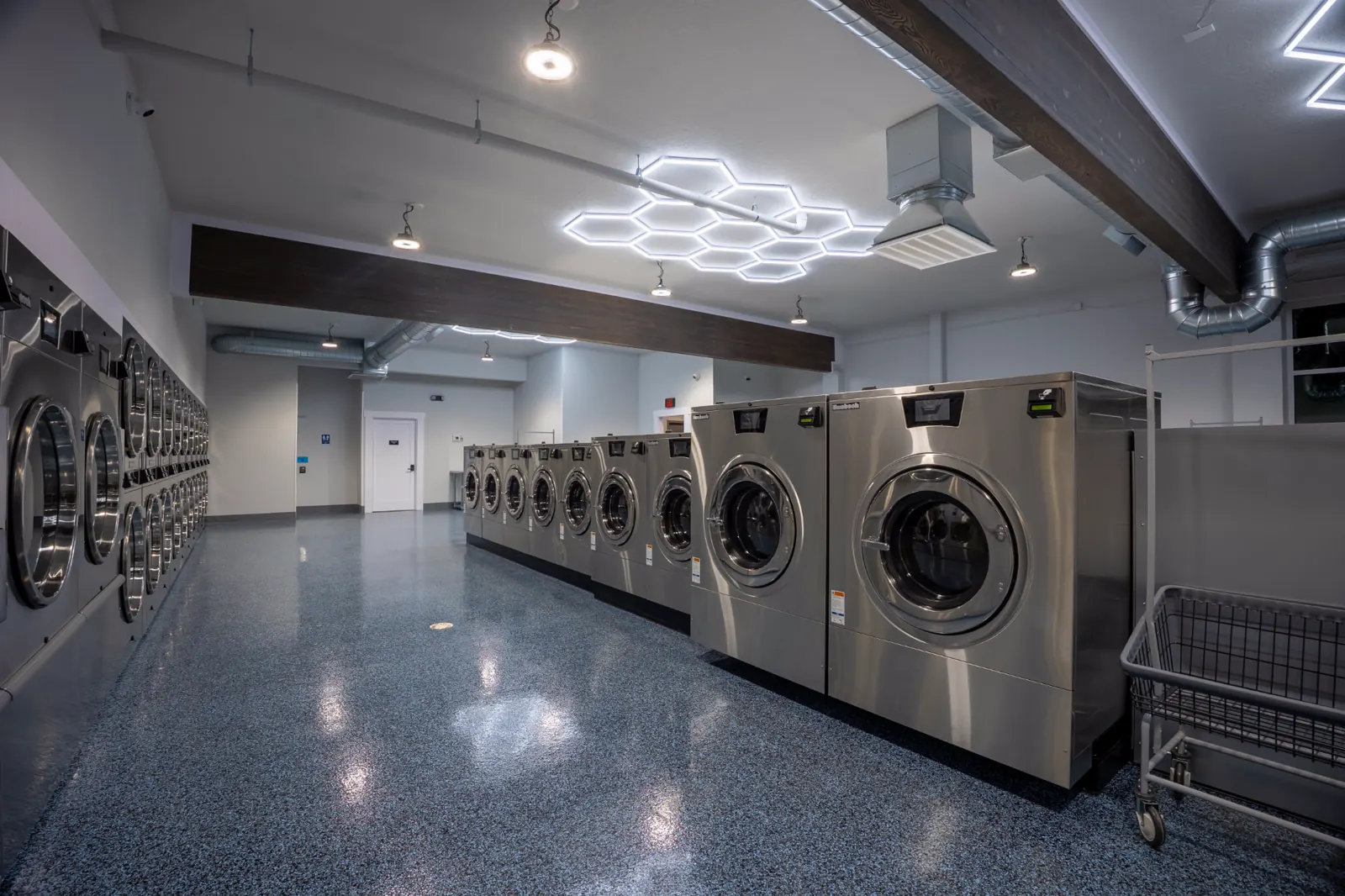 Inside 123 Laundry Spokane Valley, with rows of modern washers and dryers